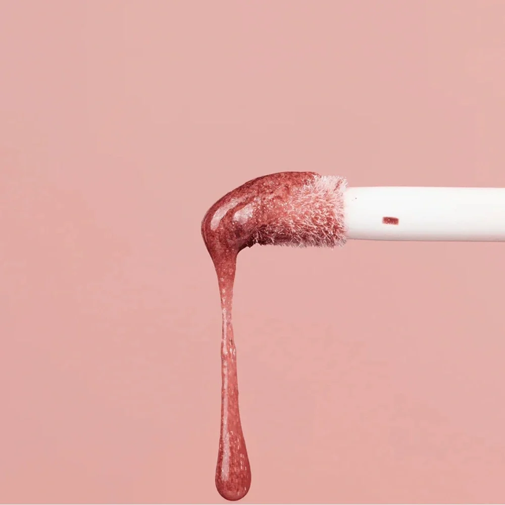 Dibs Beauty Go To Glossy Balm in Rock Candy or MIMS mega shiny pretty gloss